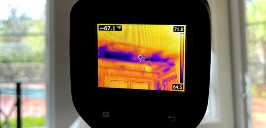 Thermal heat tool detecting cold spot in ceiling